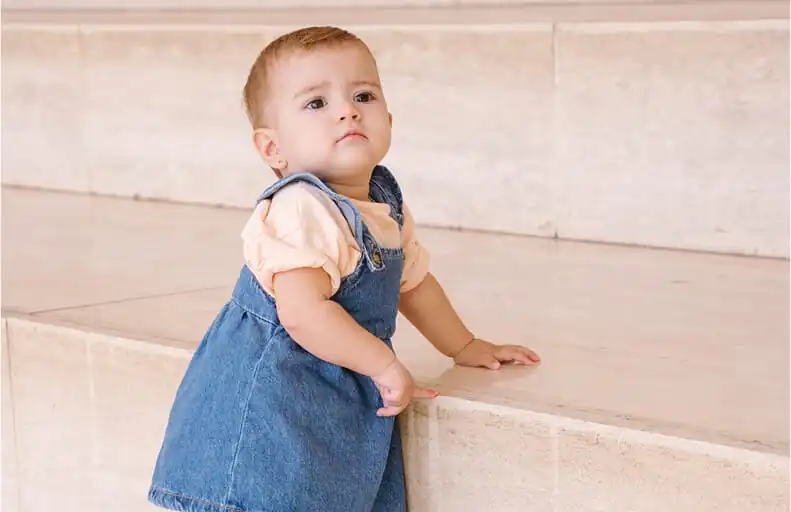 Baby girl wearing Kiddio's baby girls shoes